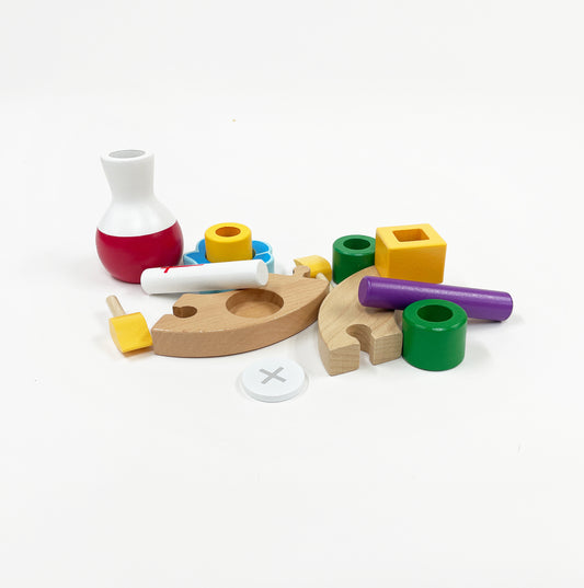 A collection of colorful christian toy parts